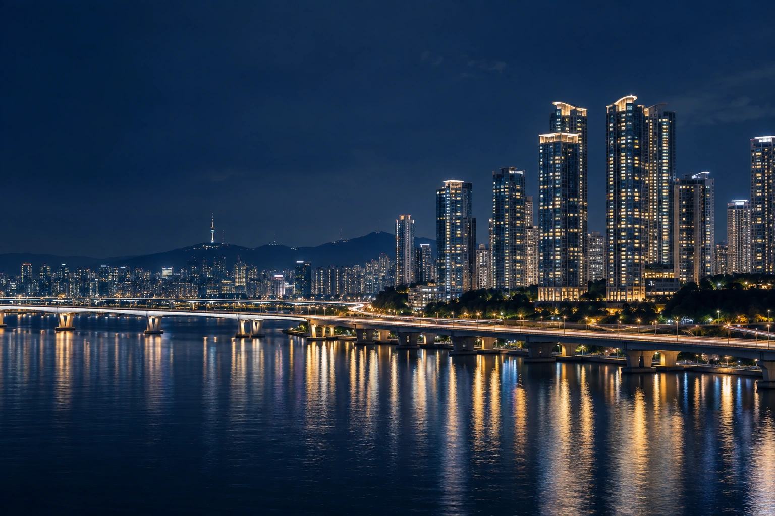 Concept view of illuminated apartment towers along the Han River in Seoul